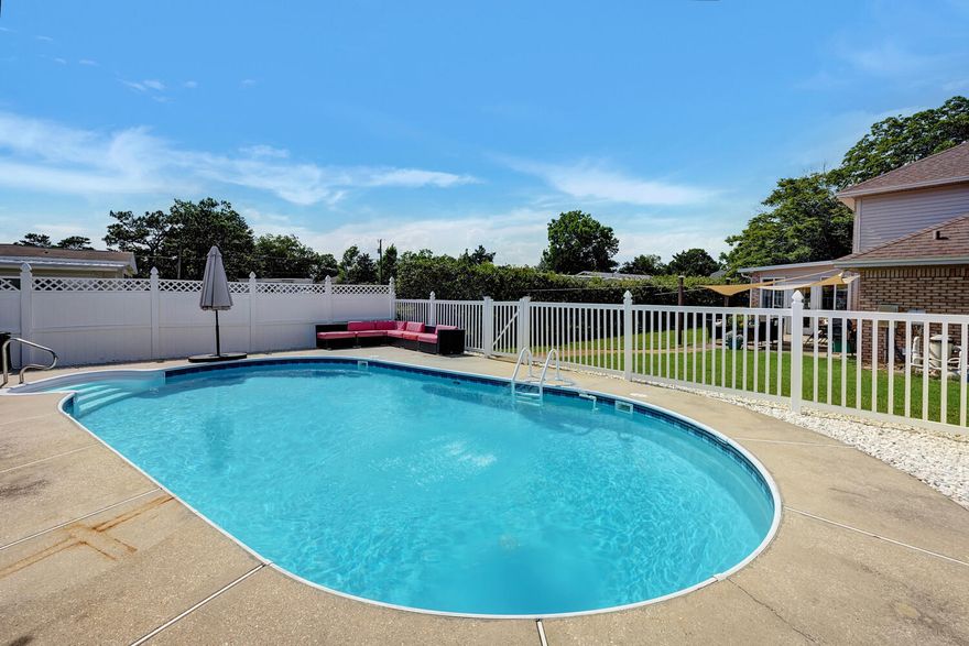 Looking for a great home in a cul de sac with a pool of your own?  You have found the one!  This 2 story 4 bedroom, 3 bath home is located on the Eastside of Navarre, and only 2 blocks from the brand new Publix.  This home features a large living area with fireplace, a great kitchen, formal dining and and office space that could be used as a 4th bedroom.  The enclosed patio is also heated and cooled and is a perfect play place for the kids, or a great place for entertaining.  The master bedroom and two remaining bedrooms are upstairs.  The outdoor patio is perfect for grilling and only steps away from your private pool.  Make your appointment today to see this beauty.