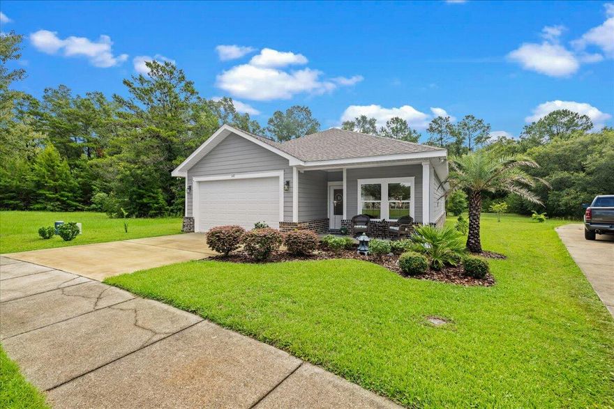Better than NEW!  Immaculately kept Destination Builders constructed home in LaGrange Landing.  Walk across the street to the community pool or fish in the community pond.  For the beach lover, you can enjoy local favorite 30A beaches and restaurants AND come home to sleep in your own bed at night.  Located 22 minutes to Blue Mountain Beach and minutes to the newly renovated bay-front Grady Brown Park, this newer 3BR/2BA home has many upgrades, including wood-look porcelain tile, a walk-in shower, French Doors, and an extended screened in porch, where a green space provides backyard privacy for your morning coffee!  This spacious 3BR/2BA home offers a peaceful retreat inside and out! Schedule your personal showing today. Furnishings are negotiable as well!