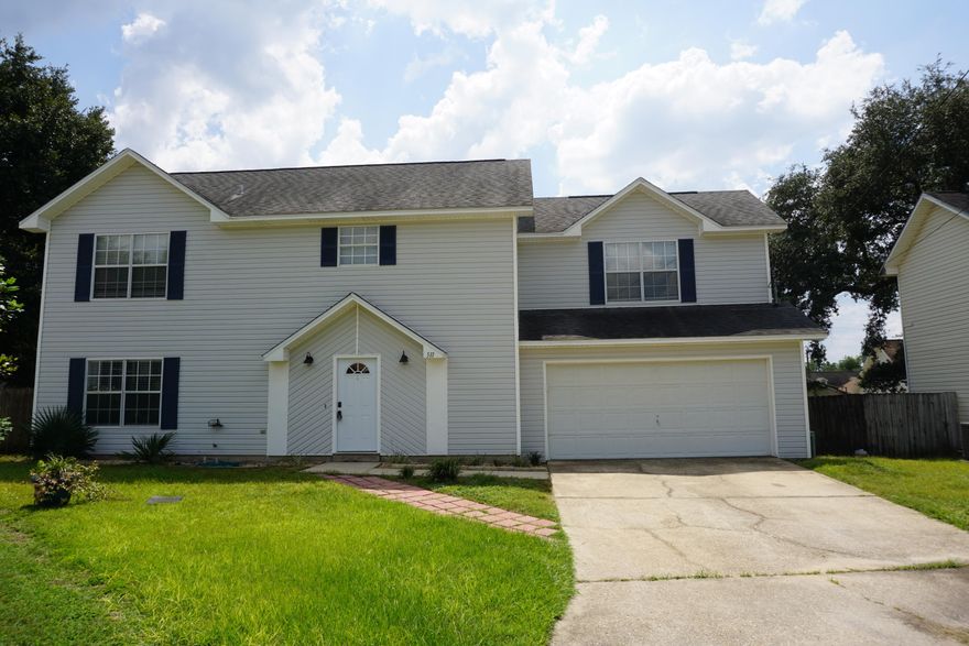This 4 bedroom, 2 story house located in South Crestview, tucked in a cul-de-sac, is ready for you to move in! Easy access to Duke Field and Eglin Air Force Base. Open flow downstairs through the living room, dining room and kitchen area, with a half bath and one bedroom. Master suite, laundry and 2 additional bedrooms are located on the second level. Large covered patio area in the backyard. Updated laminate and tile flooring on the first level.
