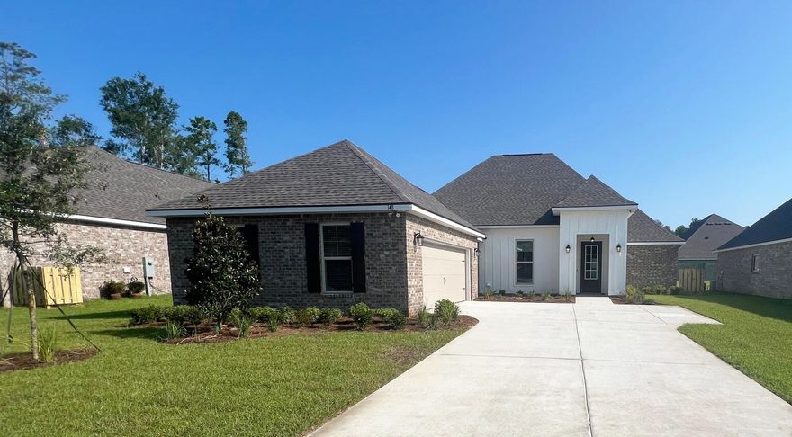 Awesome builder rate + choose TWO free: front gutters, refrigerator, smart home package, or window blinds. Restrictions apply.The CLAUDET III G in Wildflower at Hammock Bay community offers a 4 bed, 3 bath, open design with formal dining room and keeping room. Upgrades added (list attached).  Features: double vanity, garden tub, separate custom tiled shower, and 2 walk-in closets in master bath, tray ceiling in master bed, kitchen island, walk-in pantry, boot bench/drop zone in mudroom, covered rear patio, recessed lighting, crown molding, smart connect Wi-Fi thermostat, smoke/carbon monoxide detectors, landscaping package, architectural 30-year shingles, flood lights, and more!Energy Efficient Features: water heater, kitchen appliance package, and more! Energy Star Partner.