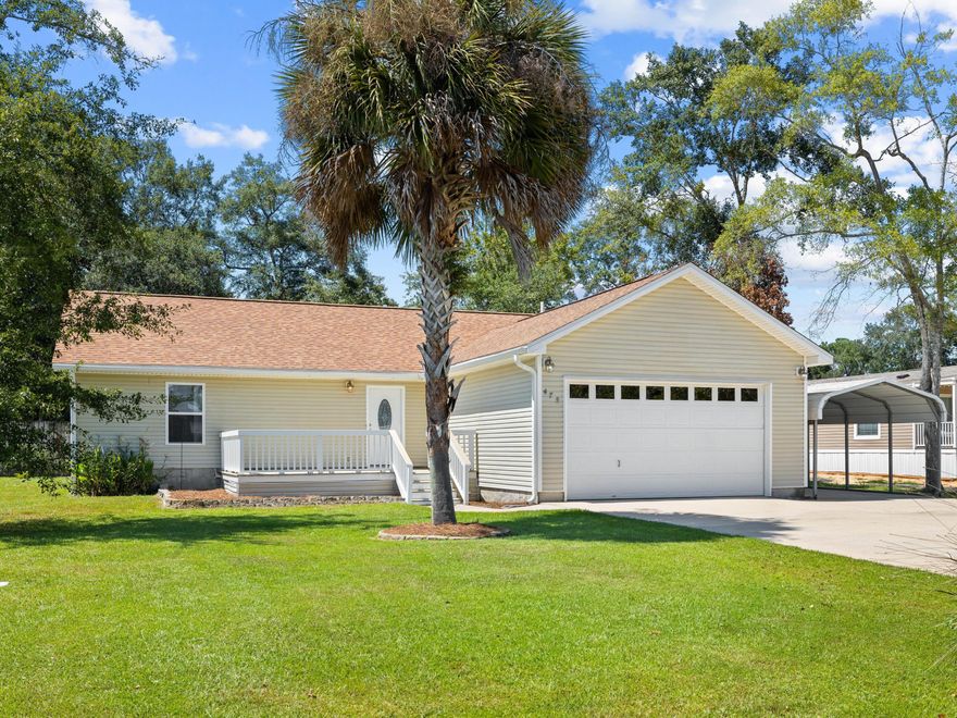 Nestled in the heart of Magnolia Baye, this charming three-bedroom, two-bath haven invites you with its open floor plan, embracing the spirit of spacious living. With no HOA and a prime location near the bay but less than 30 minutes to Scenic Highway 30A, say hello to your dream abode. This property is tailored for full-time residents, growing families or retirees seeking single-level ease. A generously sized breakfast bar adorned with granite countertops sets the stage for culinary delights. Revel in brand-new bedroom carpets and sleek tile in living spaces, highlighting a modern touch. Step into the tranquility of a fenced yard, perfect for outdoor gatherings or peaceful solitude. The two-car garage, outfitted with a hurricane-rated garage door, is accompanied by a carport, offering ample space for vehicles and storage. Freshly outfitted with a new roof in 2023 and a 2021-installed A/C, worry less and enjoy more. Make this charming haven yours and bask in the serenity of a well-maintained home, complete with fruit-tree-adorned landscaping.