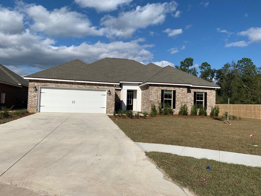 The CHRISTOPHER III G in The Trails at Hammock Bay community offers a 5 bedroom, 3 full bathroom, with a game room and an open 2 story design. Upgrades include luxury wood look tile flooring, blinds, quartz counters, upgraded cabinets and more! Special Features: Private water closet, double vanity, soaking tub, separate shower, walk-in closet in the master suite, covered rear patio, recessed can lighting, ceiling fans in living area and all bedrooms, framed mirrors for all bathrooms, undermount sinks, bronze plumbing fixtures, smoke and carbon monoxide detectors, garage door with hardware and two remotes, seasonal landscaping package, architectural landscaping package, 30 year shingles and more!