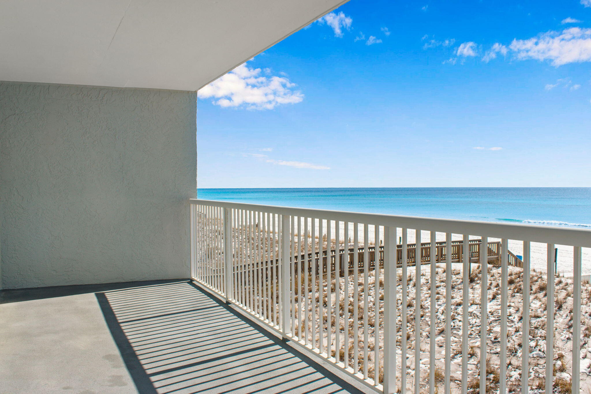 Welcome to the beach in this newly remodeled 3 bed, 2.5 bath gulf front condo on Okaloosa Island!  You'll find a freshly painted unit with a completely new kitchen with all new Whirlpool appliances, new quartz countertops, new cabinets, new carpet, new tile, new blinds, new bathroom sinks and cabinets and new full size GE washer and dryer. Enjoy your morning beverage on the oversized balcony overlooking the white sandy beaches and waters of the Emerald Coast.  With open concept living, you can cook and entertain while enjoying lots of natural light and gulf views.  You'll also find yourself close to local restaurants and attractions like the Gulfarium Marine Adventure Park.  Other amenities such as grocery stores and shops can be found in nearby Fort Walton Beach proper and Destin. This complex does allow short term rentals so whether you make this your permanent home, vacation, or vacation rental, you have options.

Amenities include a pool, an updated fitness room, remodeled lobby, covered parking for owners, mailboxes, shuffleboard, picnic areas, and on-site rental management office.  Enjoy the sunrise and sunset from your balcony, master bedroom or living room!  Don't delay; call to set up your showing today!