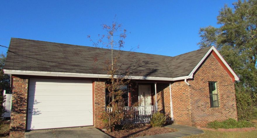 Great location, corner lot south of I-10 in Crestview. This is a 3 bedroom, 2 bath house that with a little remodeling can be a gem. The quaint kitchen is open to the living area looks out to the dining area. There is also a pantry and a small breakfast bar. The house has tiles throughout. This is a split bedroom floor plan with a good size master bedroom. There is an enclosed patio that looks out over the yard. There is also a storage type lean to in the back yard. This is an 'as is' sale. Buyer to verify all pertinent information to satisfy themselves.