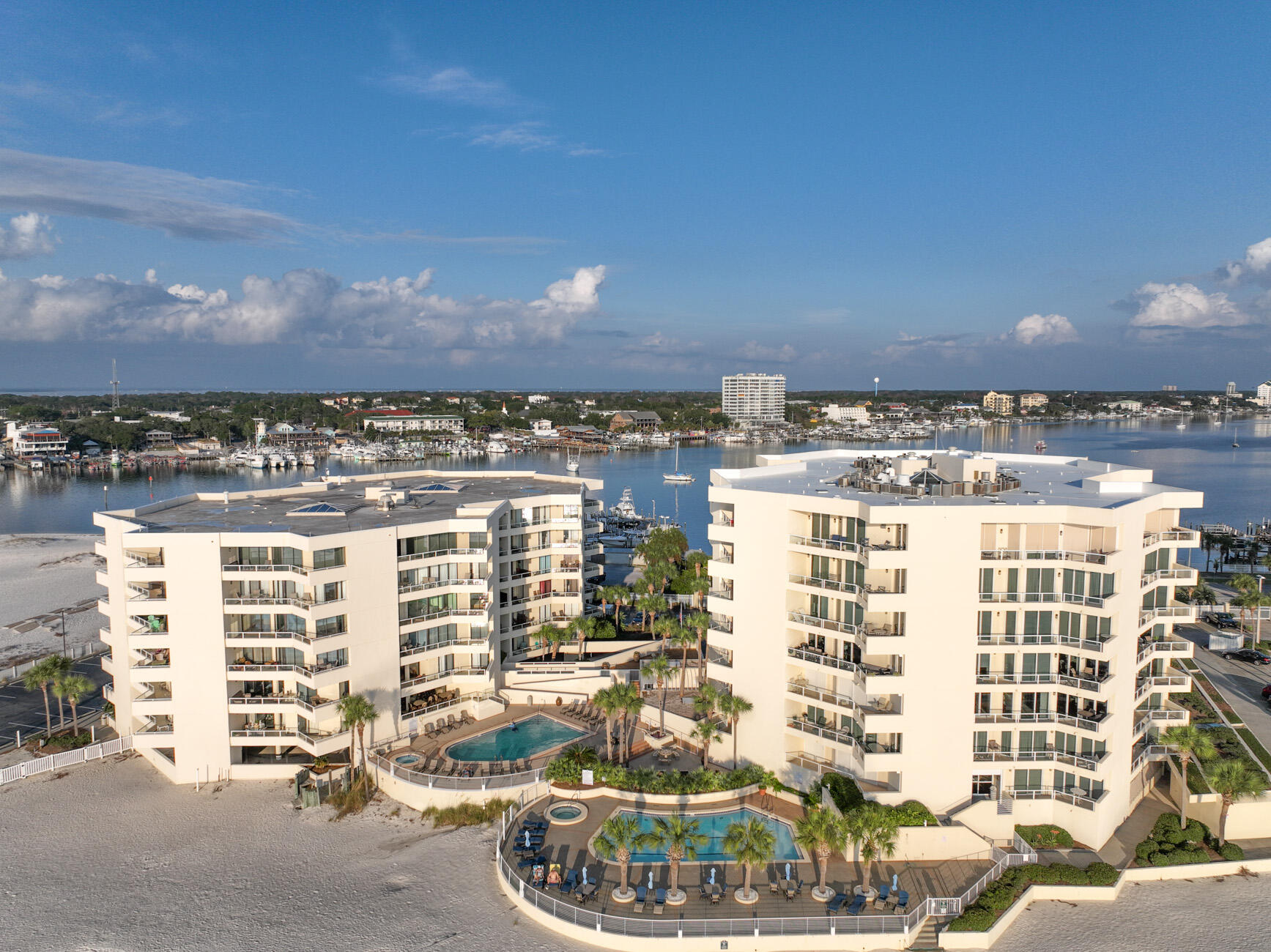 Your coastal investment begins at East Pass Towers! This beautifully updated 2BR/2BA Gulf-front condo offers breathtaking panoramic views of Destin Harbor, East Pass & the Gulf of America. Perfect for watching dolphins play, boats cruise by, and unforgettable sunrises and sunsets from your expansive 300 sq. ft. tiled balcony accessible from the living room, master, and guest bedrooms. Interior upgrades include recessed lighting, granite counters, travertine baths, stainless appliances, solid oak cabinets, freshly painted and a custom laundry area. Enjoy the resort-style amenities of East Pass Towers including a heated pool, hot tub, private beach access, and close proximity to top-rated harbor-side dining, shopping, and entertainment. Whether you're relaxing poolside, fishing, snorkeling off the jetties, or enjoying the vibrant harbor lifestyle via water taxi, this condo offers the perfect blend of comfort, location, and luxury. Located at the exclusive end of Holiday Isle-coastal living at its finest! Call today to own your piece of paradise!
