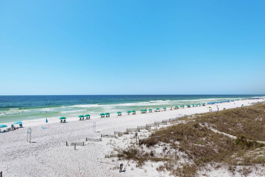 The most gorgeous unit to come on the market in Edgewater Beach Condominium in a long time.  This recently renovated jewel has everything.  It has a semi-private elevator that only serves the 1st and 2nd floors 50 feet from the front door. It has a balcony that sits just above the dunes and provides expansive views of the gulf, the beach and the pools. It has new appliances, new bedding, 2 walk-in showers, large flat screen televisions in the living room and bedrooms, etc. If the current owners did not love and use this three bedroom, three bath getaway so much, it could easily bring in $110K to $120K in rental income. Notice the second sliding glass door that opens onto the balcony. This unique feature provides natural light shared by few other units.