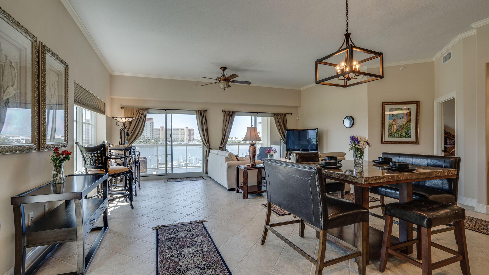 Forget Falling all over each other in a cookie cutter sized condo with tunnel vision views of one of the Nation's Top Harbors. Incredible/Expansive views of the Destin Harbor await you from this 2738 Square Foot 'Open Concept' Southeast Corner Builder's Model Unit with Kickout Balcony! The balcony at 380 Square Feet overlooks the East end of the Harbor and affords 'Awesome' Westward Views all the way to the Marler Bridge. Not only will you enjoy the daily Maritime Activity, but you'll be taking in Magnificent Sunsets early in the evening. Go ahead and LIVE LARGE in this Four Bedroom - Four Bathroom condo with 12 foot ceilings & the Master Suite directly Harbor front. Look at the photos to discover the outstanding Kitchen Layout with great views, wide hallways, an oversized entry foyer,