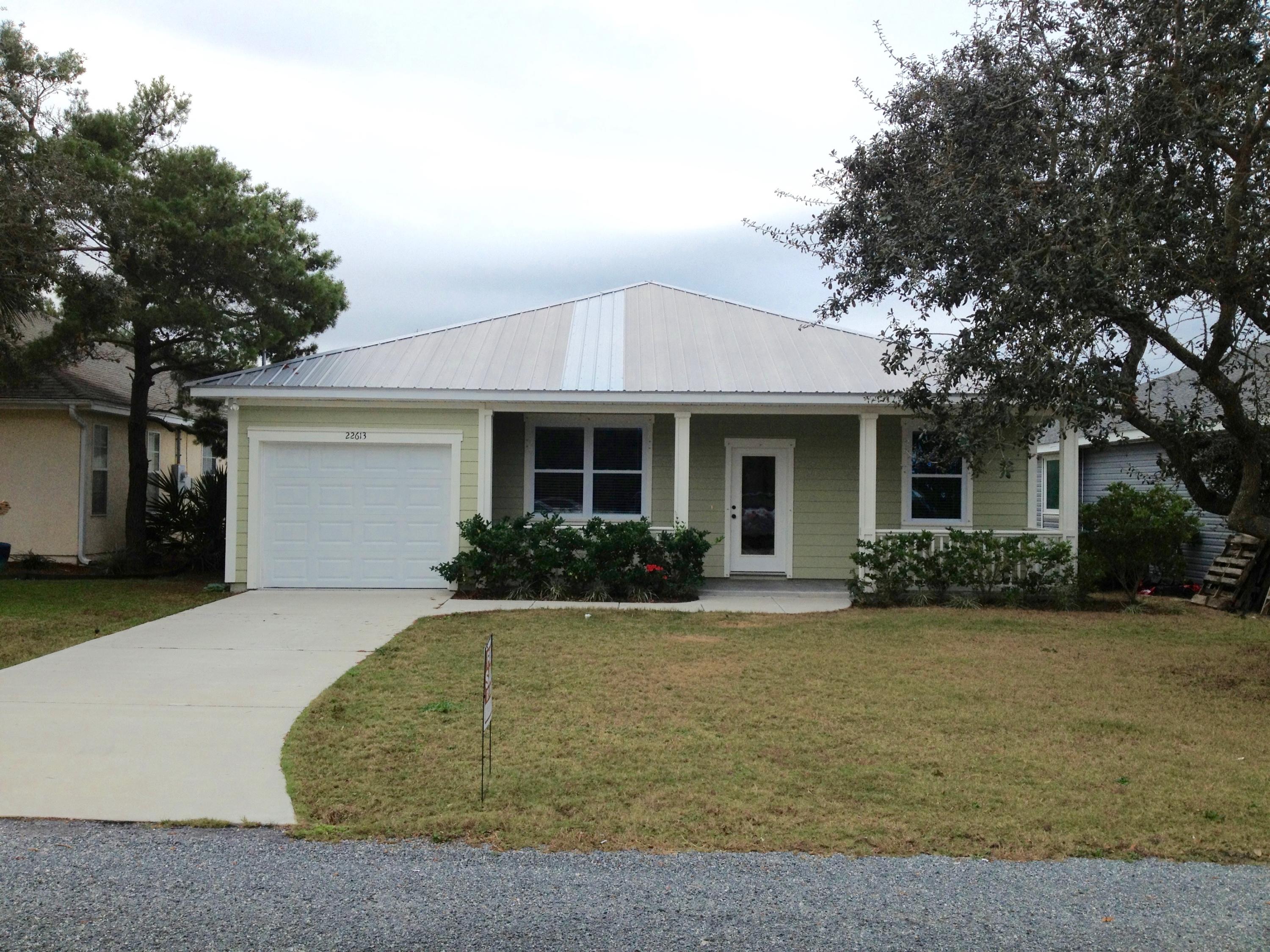 Great home, (OWNER FINANCING) close to the beach, looks brand new, built in 2013, hardy board siding, metal roof, one car garage, granite counter tops, great master suite, golf cart friendly community. Close to Pier Park and 30-A, Great area.