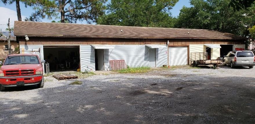 Commercial Triplex with 2 units occupied at a rent of $595 each. Access is at 429 Green Acres Road. Roll up doors are 10'x 7'. Ceiling height is 10 feet.