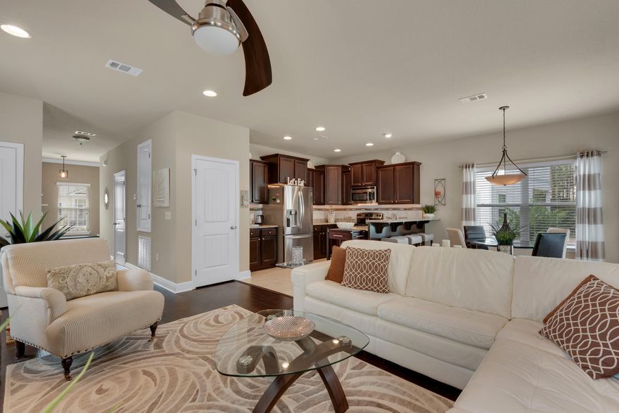 This beautiful-coastal style home is located in the private community of Topsail Walk. It is less than -1/2 mile away from public bay access/boat ramp and is minutes from the beach, Sacred Heart and Grand Boulevard shopping. The downstairs is light and airy with an open and spacious floorplan. An extended deck out back is ideal for entertainment or relaxing after along day. The upstairs is very accommodating with its two exquisite master suites, a perfect way to end your day. **Buyer to verify all dimensions and sq footage and anything else they deem important.**