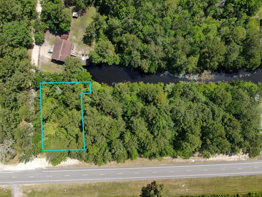 Come check out this canal front, corner lot just west of Freeport, FL encompassing almost .41 acres. Build your dream home and bring your toys and boat. Be close to all the action of some of the World's most beautiful beaches and a public boat launch. Never miss a sunset on the water again. Call today before this lot is gone.
