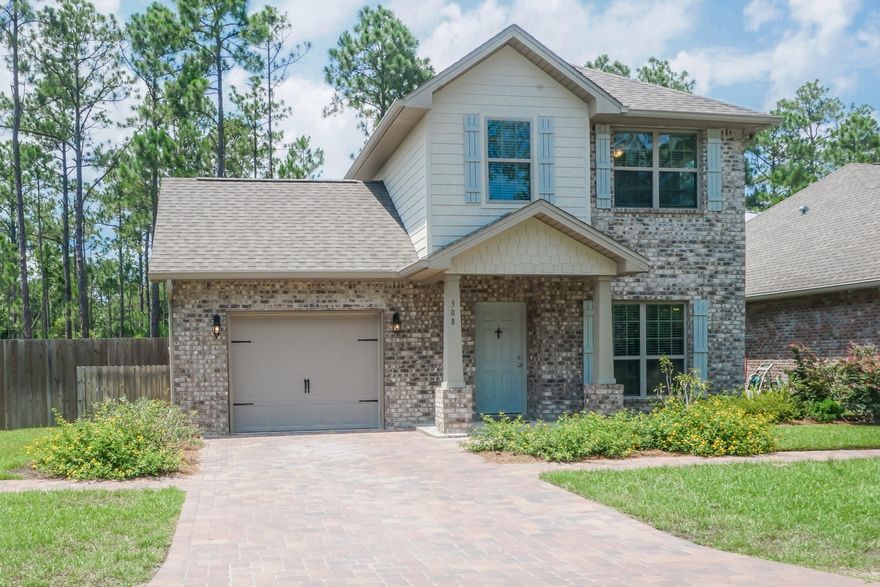 As we say in real estate...Location...location....The bay is located just around the corner with access to a public park. Great for paddle boarding, kayaking, picnicking or just watching the beautiful sunsets. The home is only 11 minutes to our beautiful white sugar sand beaches of Walton County, 15 minutes to Grand Blvd and about 13 minutes to Sacret Heart Hospital. As you walk up to this well maintained home not only do you notice the sturdy brick construction, but the very quiet setting of the neighborhood. When entering the home you are greeted with dark hardwood floors and an open living space to the kitchen.The kitchen boasts granite counters,stainless steel appliances and a very functional work space for the cook of the family. There is a hardwood staircase leading to th