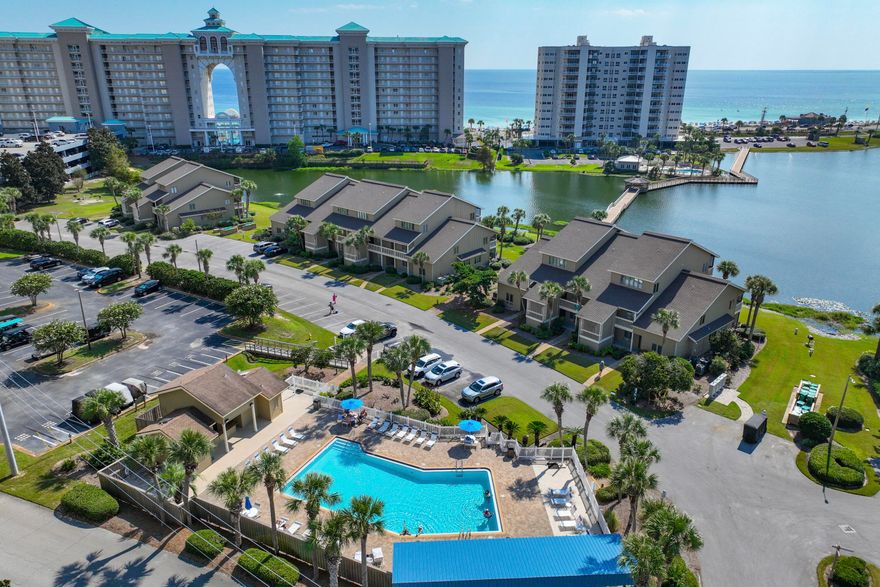Excellent investment opportunity with rental projection over $80K! Discover this beautifully refreshed, 3 bedroom unit at Seascape Resort. With stunning views of both the serene Lake Stewart and Gulf of Mexico, this multi-level unit features new LVP flooring, fresh interior paint, and updated furnishings throughout. The spacious second-level master bedroom offers breathtaking views of the freshwater lake and Gulf, while the enclosed patio on the first-level provides the perfect spot to relax and enjoy the nature. Behind the condo, a boardwalk stretches over the lake to Scenic Hwy 98, offering a scenic shortcut for direct beach access.Seascape is a gated community that provides an abundance of amenities including onsite golf, tennis, pickleball courts, 2000 ft of beach, water-sports, bike rentals, pools, charcoal grills, outdoor shower stations, and two gate guard houses for added security. Additionally, there are multiple golf cart charging stations conveniently located near the unit. 

Don't miss this opportunity to own a piece of paradise in Miramar Beach!