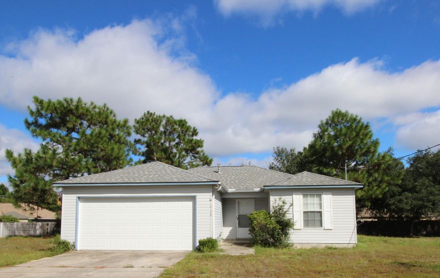 LOOKING FOR THE PERFECT HOME AT AN AFFORDABLE PRICE? Situated on over a 1/4 acre lot at the end of a quiet street. Spacious living area with raised and vaulted ceiling and designed to give you plenty of wall space for your furnishings. Kitchen has a window over the sink, pantry and lots of cabinets and counter space to include a small breakfast bar. Light and bright dining area with a large window overlooking the backyard. Private master bedroom with a walk-in closet. Master bath has a garden tub. Two additional bedrooms and a full bath complete this perfect package. Newer roof, A/C system and a hurricane reinforced garage door. Close to everything just minutes from Hurlburt AFB, shopping, restaurants and white sandy beaches and Navarre's Fishing Pier. Call today to view!