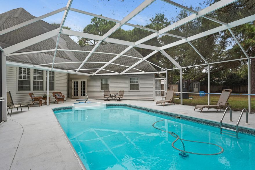 OutstandingMeticulously KeptLarge Family Home with a BIG Inviting Pool & Screened Lanai complimented by an enormous fenced in backyard with mature trees, and an outside storage building.(Click on the photos and virtual tour) to discover the many upgrades that have been done to the property with gorgeous granite, cabinetry, and designer faucets & sinks in the kitchen and all bathrooms. Experience the comfortable feel of the home as you enter the front door with soaring 18 foot ceilings. Relax in the over sized living room, and retreat to total comfort in the large bedrooms. Enjoy being able to entertain from the incredible kitchen with high end appliances, plenty of pantry space, and a very well placed service bar. Come see it today, buy it, and love it forever!