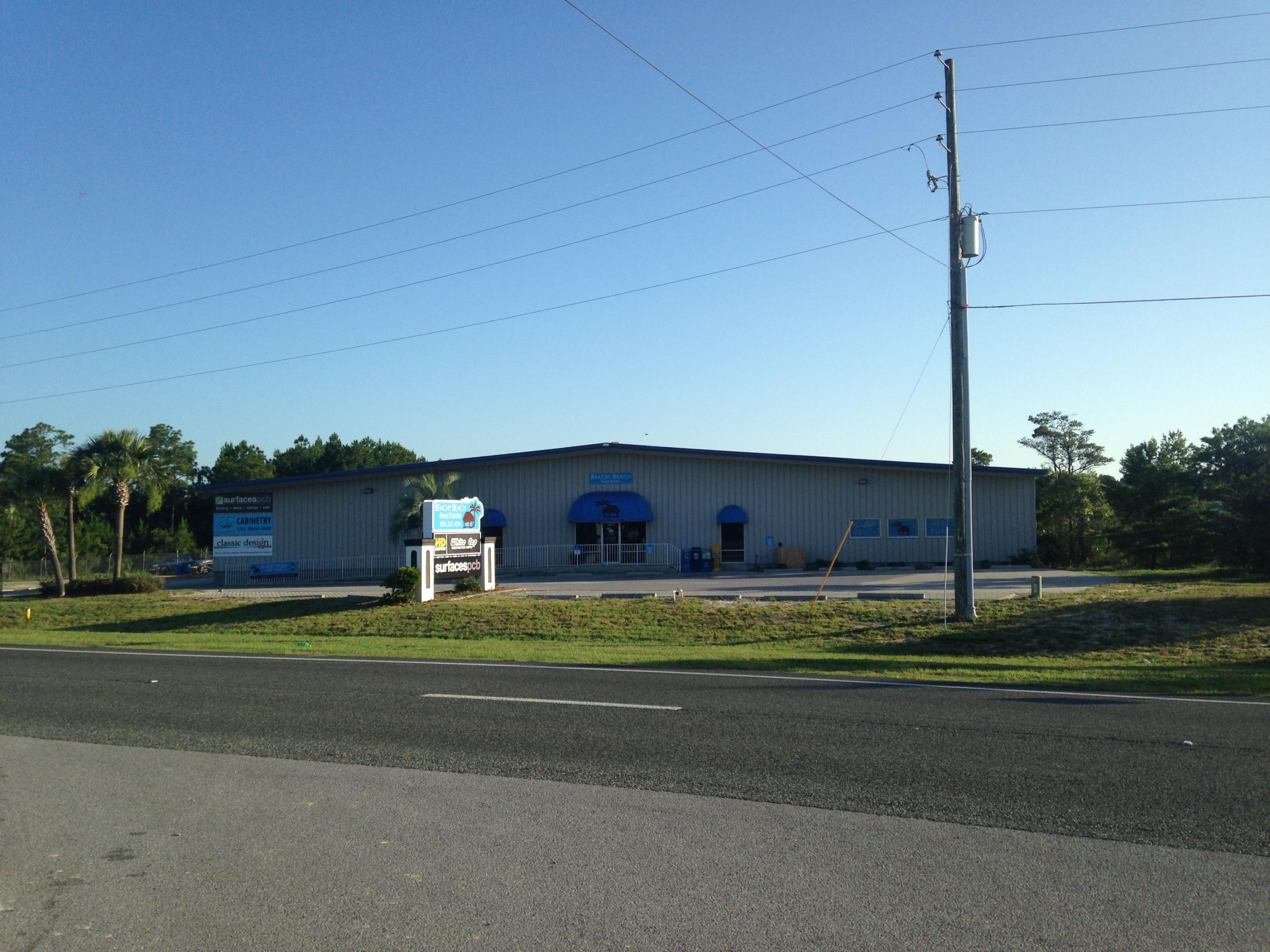 WOW !! 33,000 SF ON 3.5 acres with 225' on the Pkwy and only one mile East of Hwy 79 and less than 15 miles from the Airport and 10 miles from 30-A. Building is fully leased with long term leases. Building was built in 1996 and is zoned commercial on the front and Light Industrial on the back. Property has great exposure and easy access via the Pkwy and a Median cut, plus back access via Beach Commerce Park. The building has 16' eave height, three (3) loading bays with 14' x 16' roll up doors. In addition, has a large 20' x 16' with ramp loading door on the North side.