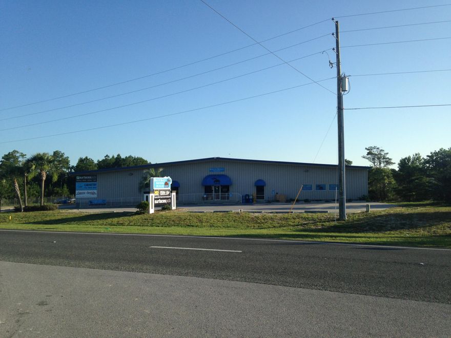 WOW !! 33,000 SF ON 3.5 acres with 225' on the Pkwy and only one mile East of Hwy 79 and less than 15 miles from the Airport and 10 miles from 30-A. Building is fully leased with long term leases. Building was built in 1996 and is zoned commercial on the front and Light Industrial on the back. Property has great exposure and easy access via the Pkwy and a Median cut, plus back access via Beach Commerce Park. The building has 16' eave height, three (3) loading bays with 14' x 16' roll up doors. In addition, has a large 20' x 16' with ramp loading door on the North side.