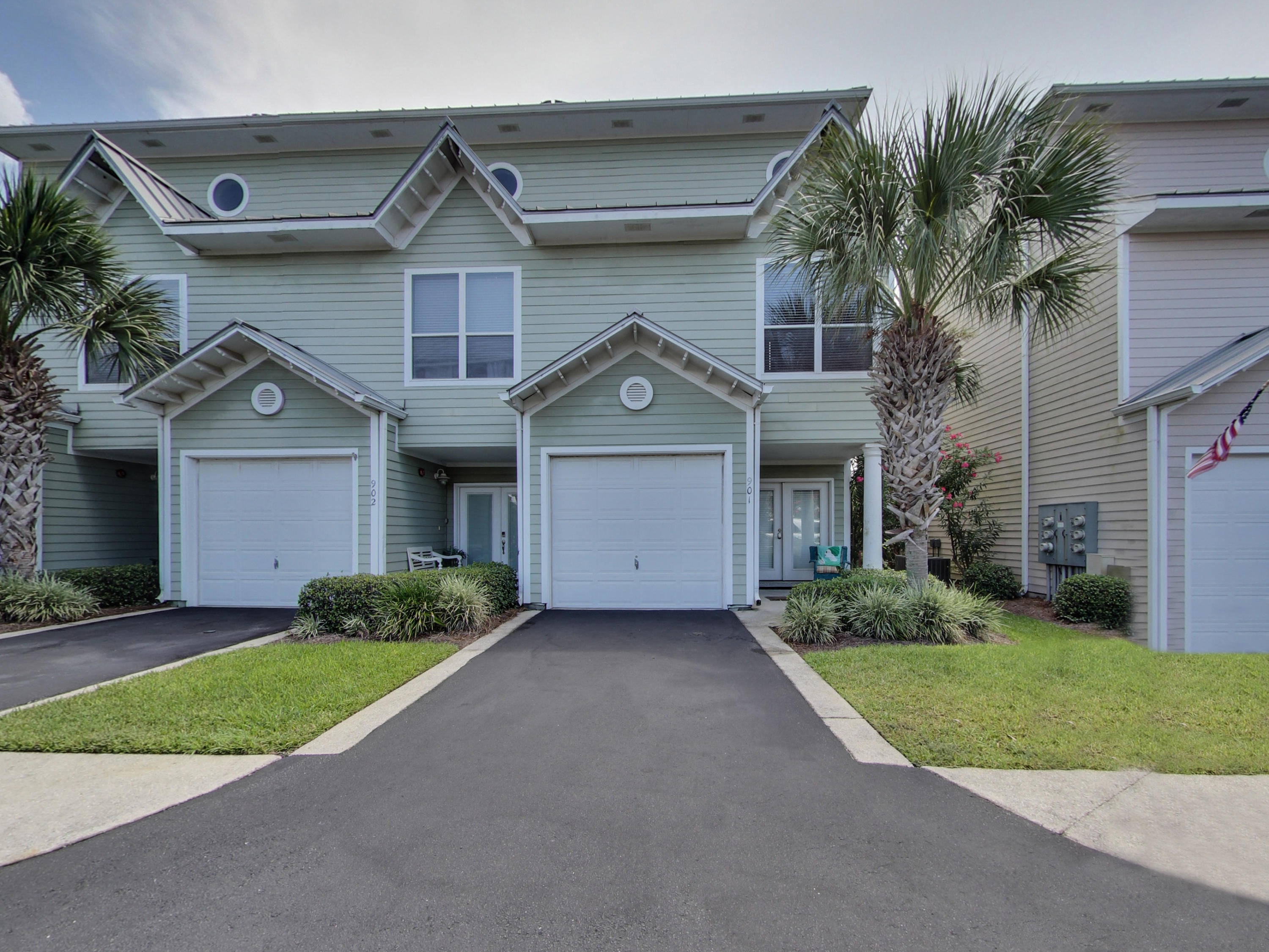 This is your opportunity to own a lovely 3-story townhouse in a super-convenient location within walking distance to your private, deeded beach access and near popular local restaurants and area attractions. Beach Pointe also offers a heated pool with cabana steps away from the front door. The ground level front door opens into foyer leading to large BR with patio and ensuite bath. Stackable W/D & garage entrance are also on the first floor. The large living room and chef's kitchen are on the 2nd level along with the 2nd bedroom and full bath. The 3rd floor is entirely made up of the huge master bedroom with 9' ceilings boasting a sitting area, morning kitchen, walk-in closet, and covered balcony. The ensuite master bathroom offers dual vanities and bath/shower combo.