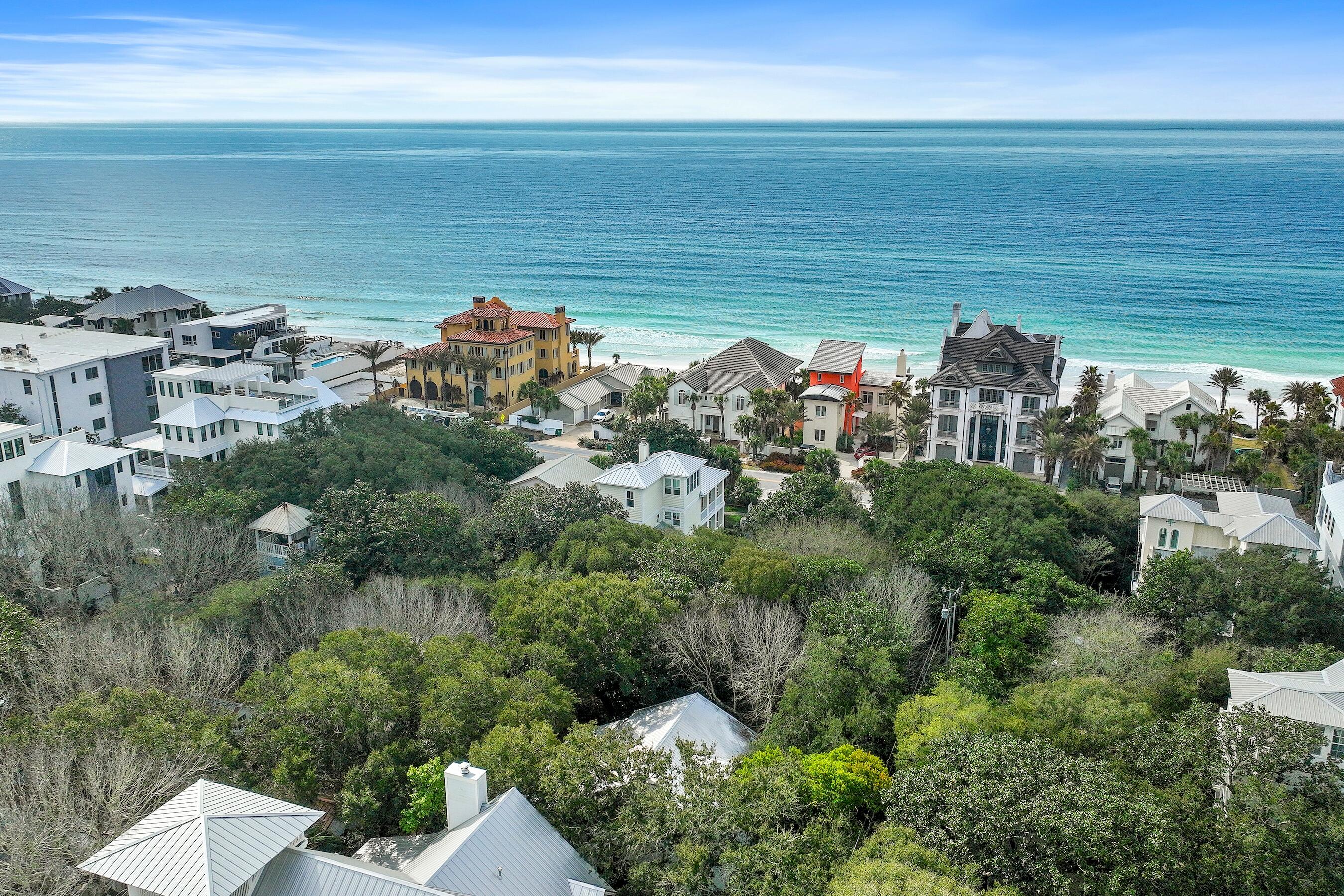 One of a kind Home for sale in Beautiful Old Seagrove!Nestled just one house from the enchanting 30A and the Gulf, this remarkable property offers an unparalleled blend of charm, space, and proximity to the stunning Florida Gulf. 1 block from SEASIDE. This charming home is situated on a oversized lot, surrounded by majestic live oak trees that provide a serene, shaded oasis, perfect for outdoor gatherings and relaxation. Walking distance to the beach and Seaside. 3 bedrooms with very high ceilings and open living room and kitchen. Welcoming porches in the front and the back. This is a one of a kind property with easy Gulf Access and in Old Seagrove's only brick paved street. Truly a one of a kind property.