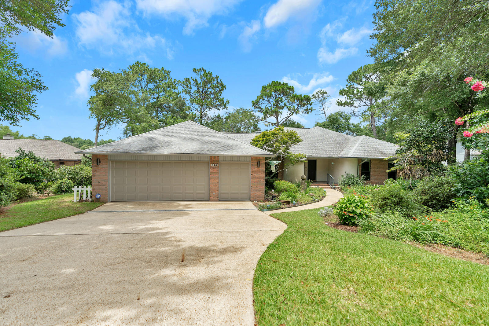 This beautiful, well kept custom lake home is located in the sought after community of Rocky Bayou Country Club Estates. The home sits tucked against Lake Henderson within the Rocky Bayou Golf Course community and is beautifully landscaped with incredible lake views throughout. Fish, kayak or just relax on the dock with an Arnold Palmer and take in the fresh air and local wildlife. The home sits on a large lot with plenty of trees and privacy. Walk through the front door and tranquil views of the lake greet you in the foyer. The living area is very spacious and soaks up the natural light coming in from the large windows. The kitchen has all the appliances you would need to entertain including ice maker and plenty of pantry space.