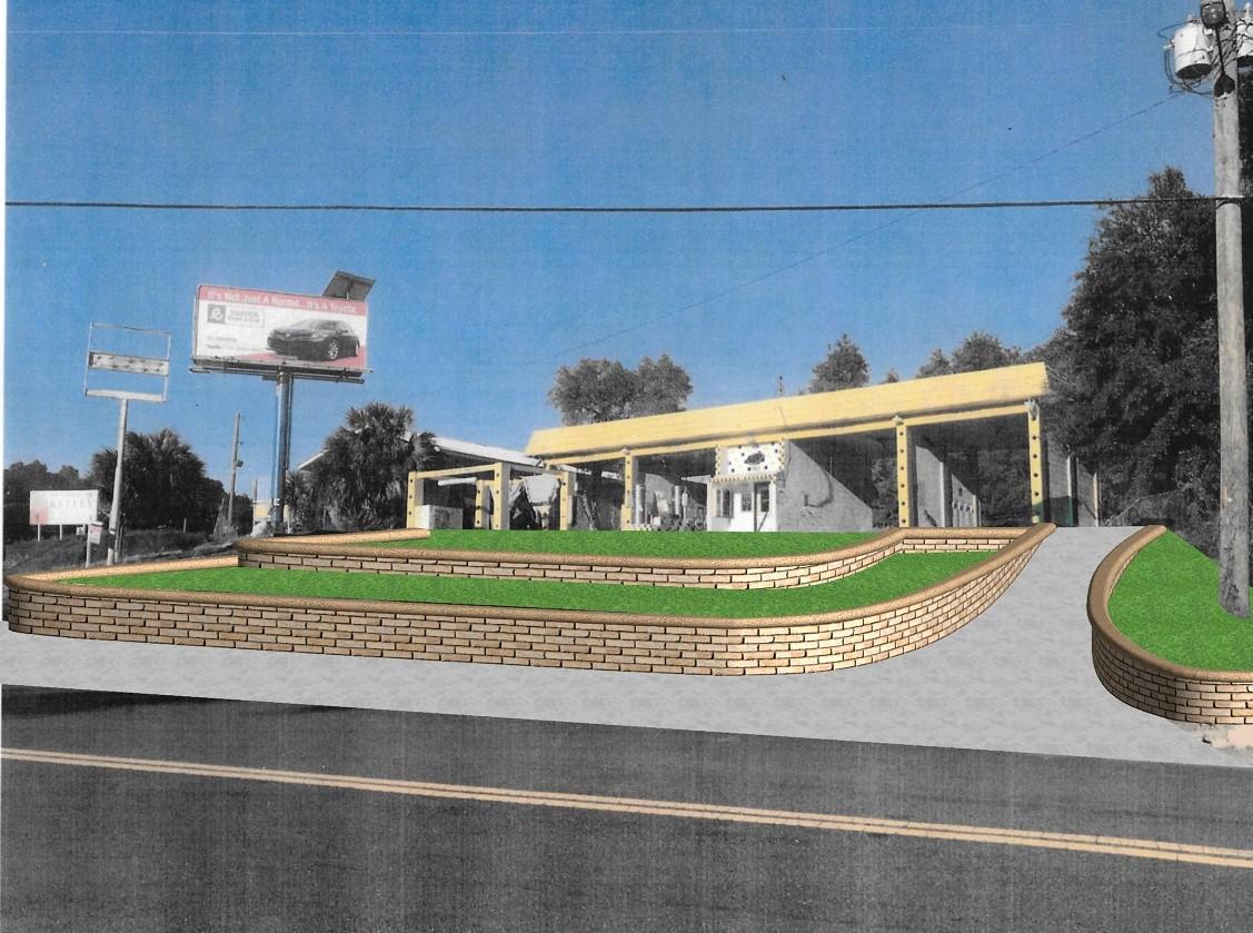 Seller has the plans. PROPERTY CAN BE RENOVATED, IF YOU WANT TO DO IT YOUR OWN WAY, NOW IS THE TIME. What a diamond in the rough with so much potential on this high traffic road way. Corner of Hwy 85 on Howell Rd by Hwy 20. It is being offered AS IS at a great price of less than $130K. Ever dream of having your own coffee shop? Office space? Repair shop? Imagine the drive through traffic of everyone going to the base every morning / evening & stopping by. Bring your plans and ideas. See other Renderings of retaining wall and graded driveway seller willing to do for listing price of $250K.. Estimates are available for an entire remodel to office space. Why wait ...live your dream.