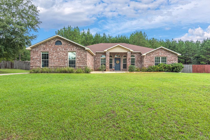MOVE IN READY! Gorgeous home in the quiet country feel neighborhood of Yellow River Plantation just north of Crestview! Inviting front walk way and porch, this home is cleanly landscaped and minimalistic for low maintenance. Providing all your needs with a private office, living room and a family room. The kitchen features granite, stainless steal appliances, a center island and a breakfast bar. The living area leads into a family/sunroom through French glass doors. The master bedroom is large enough for a king size bedroom suite and the master bath features double vanities, a garden tub and a separate shower. The back patio is large and inviting for all of your outdoor entertaining including a 22ft above ground pool. The garage is large enough for 3 cars. Low county taxes. Will go fast!!