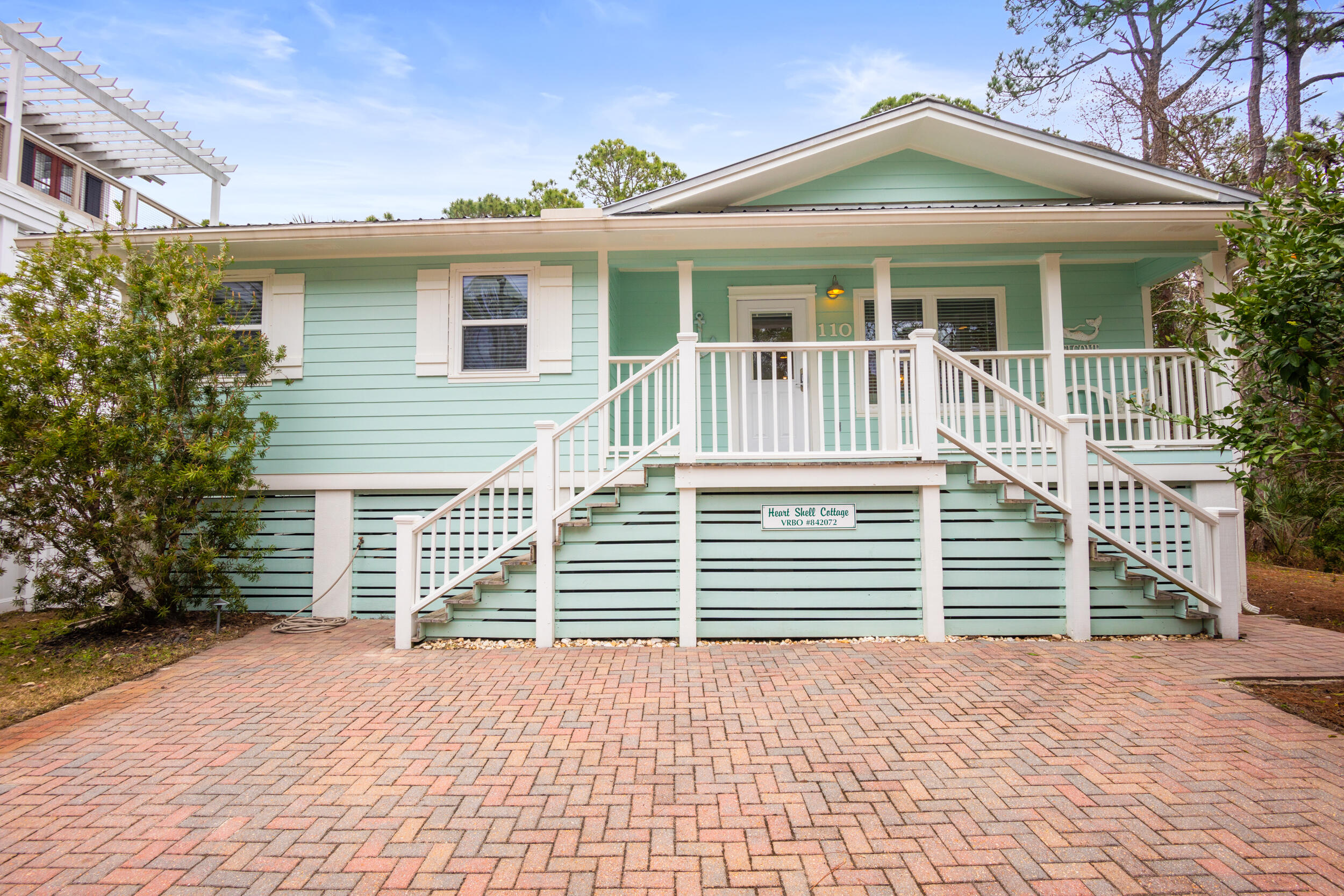 Welcome Heart Shell Cottage!  Newly renovated, this quaint and charming beach house is located on a quiet and peaceful dead-end street in beautiful Seagrove Beach just off Hwy 30A. The house has 2 bedrooms and 2 bathrooms, stainless steel appliances, granite countertops, and a sea inspired backsplash.  The additional 240 square foot enclosed porch adds to the living space for the home.  The screened porch is located just off the kitchen and leads to a beautiful large deck that has an outdoor shower.  The heated pool gives year round pleasure for you and your guests to enjoy the lushly landscaped backyard oasis. When you are ready to hit the beach, the nearest beach access is only a 5 minute stroll away. Heart Shell Cottage is located just minutes away from the charming town of Seaside.