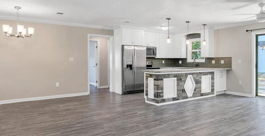 CHECK OUT ALL OF THESE UPGRADES! New roof & HVAC system 2024. This home offers many upgrades including remodeled kitchen with granite countertops, stainless steel appliances, cabinets and tiled backsplash. Remodeled bathrooms with granite and tiled baths. Luxury vinyl plank flooring throughout, upgraded electrical wiring and natural gas water heater. Privacy fenced backyard with bonus 11.5' X 15' spacious workshop, art studio or storage building with vaulted ceiling. This home is located in a low traffic sought after neighborhood convenient to schools, FWB Recreation Center, military bases, beaches, shopping, restaurants, Fort Walton Yacht Club, entertainment and so much more. Move in ready! Make your easy appointment to see today!