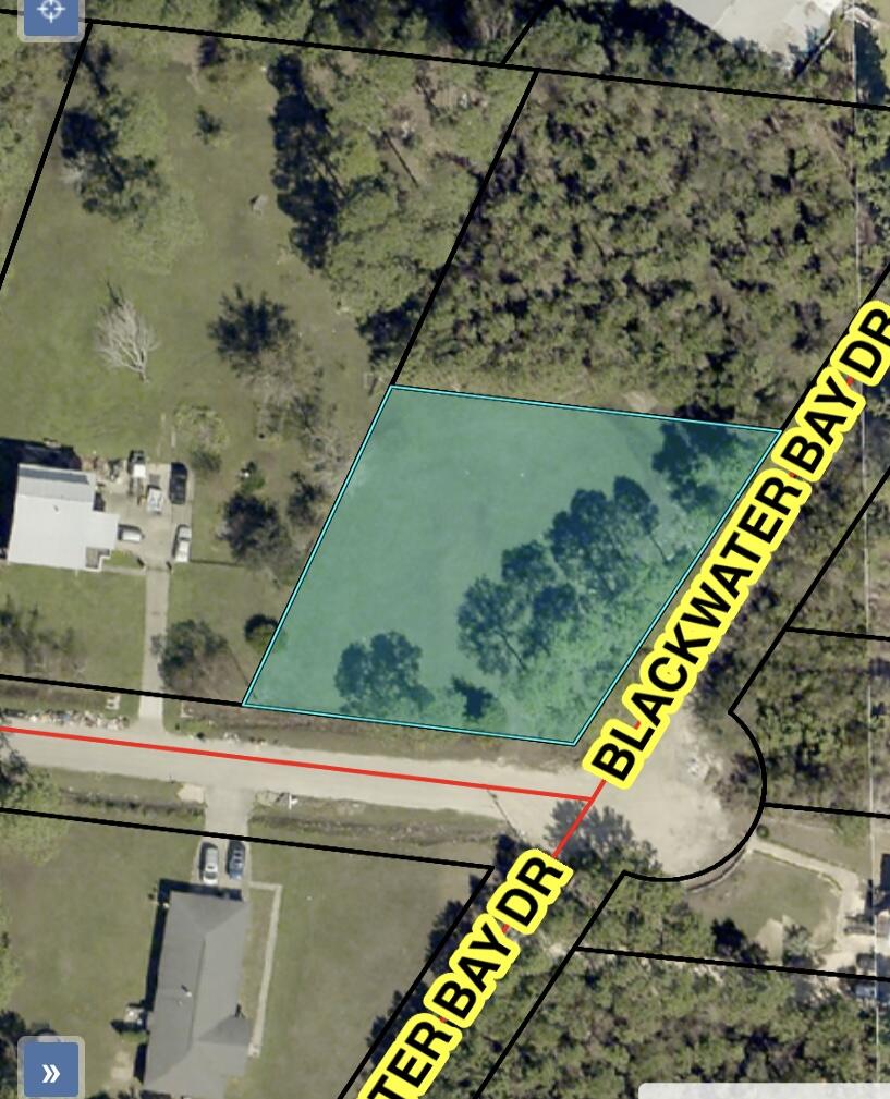 Nice corner lot across the street from Blackwater Bay, leading to East Bay. Ready to build your new home?? Check out this 1/2 acre lot! Mostly cleared and grassy with a few trees. Flood zone AE, flood insurance required. No tap fees paid. Residential single familly zoned R1. Lot dimensions from SRCPA. Buyer responsible for due diligence. All information is deemed to be reliable, but buyer should conduct feasibility study and research zoning, planning, property use, tap fees, setbacks, flood maps and any other information buyer deems important before purchase. Lot being sold AS IS. Drive by call for appointment to walk the property. No sign yet on property.
