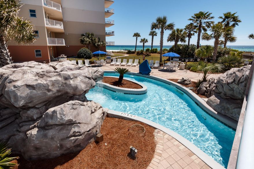 Waterscape, the Emerald Coast's Favorite Beach Front Resort! Golden opportunity to purchase this conveniently located first floor handicapped accessible unit.  This spacious 1,292 sq ft..unit sleeps 8 comfortably and boasts 2 bedrooms + bunk room and 2 .5 baths. Interior features include low maintenance tile through-out, stainless appliances, granite kitchen counter tops, 8' 10'' ceilings, crown molding, beautifully furnished, luxurious baths w soaking tubs and huge separate showers, 8' deep, over sized balcony w/ access from the living area, master  and guest bedrooms and separate climate controlled owner storage. Waterscape amenities include a fabulous courtyard, featuring two levels of pools, one heated, toddler play park, Lazy River, Waterfall, 2 spa