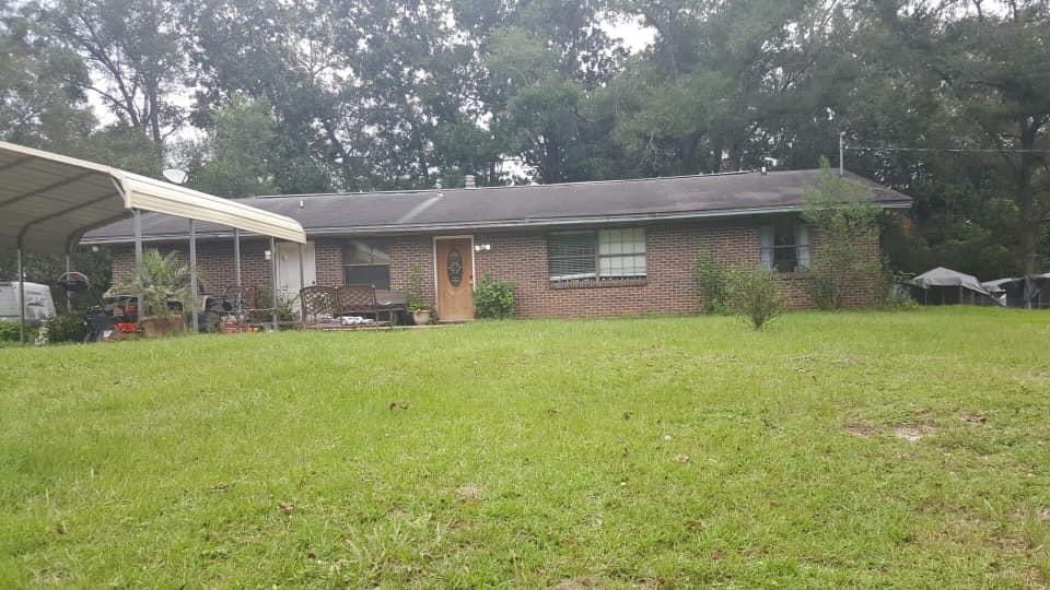Beautiful location on the bluff!! YOU can literally see for miles from the deck. Pool needs a new liner and the home is big! It needs TLC and some upgrading!!With some work this home OVER 2,000 sq ft will be a great family home! Get the closeness to Freeport for shopping, boating and fishing and the beaches too without the high cost of taxes!! Enjoy your very own pool time with family and friends, while also planting your very own garden.Its in the county so have your horses, and pets and chickens and cows! Bring back the beauty of the farm!! PRICED to SELL quick with 10 acres of land to spread out!!