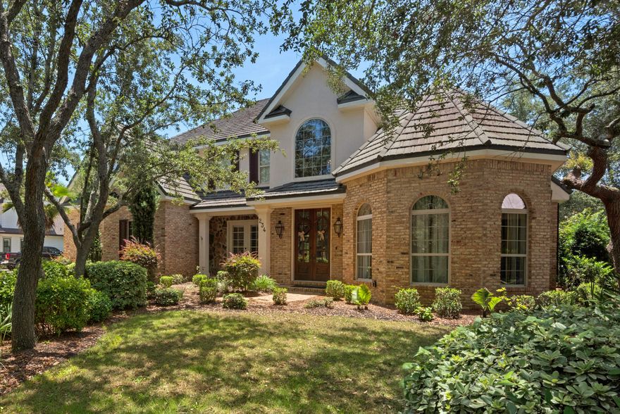 Located in the tree-lined, gated neighborhood of Botany Bayou, just moments away from the beautiful Gulf beaches of Santa Rosa.This luxury four bedroom home is stunning from the moment you open the 10 foot wooden front doors. Step inside the two-story foyer and gaze up at the custom chandelier that greets you.Your entire family will have room to spread out and relax in the expansive living area with 24' trey ceilings accented with double crown molding. A gas fireplace and built-in surround sound too! Cook dinner for your family or prepare to entertain a crowd in the large Chef's kitchen. Double Bosch dishwashers, Viking 6 burner gas cook top, and Sub-zero refrigerator and freezer, and gorgeous Chicago brick flooring are just a few of the quality kitchen details.Many more features to see