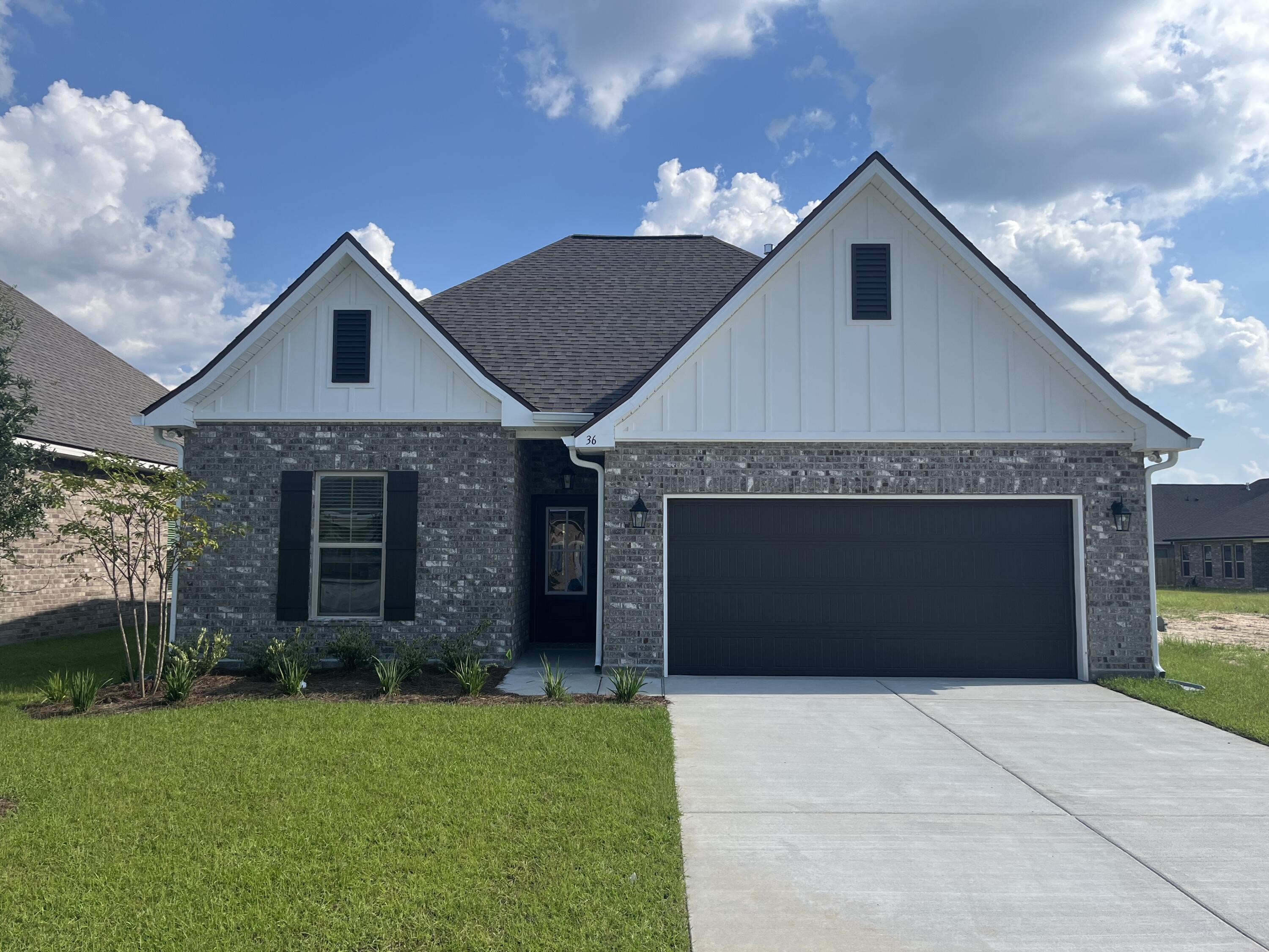 The FALKNER III G in The Bluffs at Lafayette community offers a 4 bedroom, 3 full bathroom open design. Upgrades added (list attached).Special Features: double vanity, garden tub, separate shower, and walk-in closet in master suite, en suite bath in bed 4, kitchen island, walk-in pantry, covered rear porch, crown molding, recessed lighting, ceiling fans in living and master, framed mirrors, smoke/carbon monoxide detectors, landscaping, architectural 30-year shingles, flood lights, and more!Energy Efficient Features: tankless gas water heater, kitchen appliance package with gas range, vinyl low E windows, and more! Energy Star Partner.