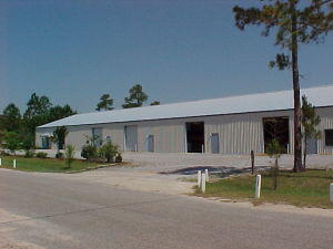 13,200 sq ft warehouse/flex space available for end user or investor! Features 5 bays each with 10' x 12' roll up doors and their own separate electric meter and stubbed with plumbing for bathroom. 3 Phase power already in the building. Owner has installed brand new roof as well as building insulation. All interior office space has been recently remodeled. New HVAC units. Suite A on west end of building has approx. 3375 sq ft space (1550 sq ft office space and 1826 warehouse). Interior warehouse spaces are demisable with wall into suites B, C, and D. Each contains approx. 2200 +/- sq ft warehouse space. suite E on east end of building contains 2450 sq ft (550 office space and 1900 warehouse).