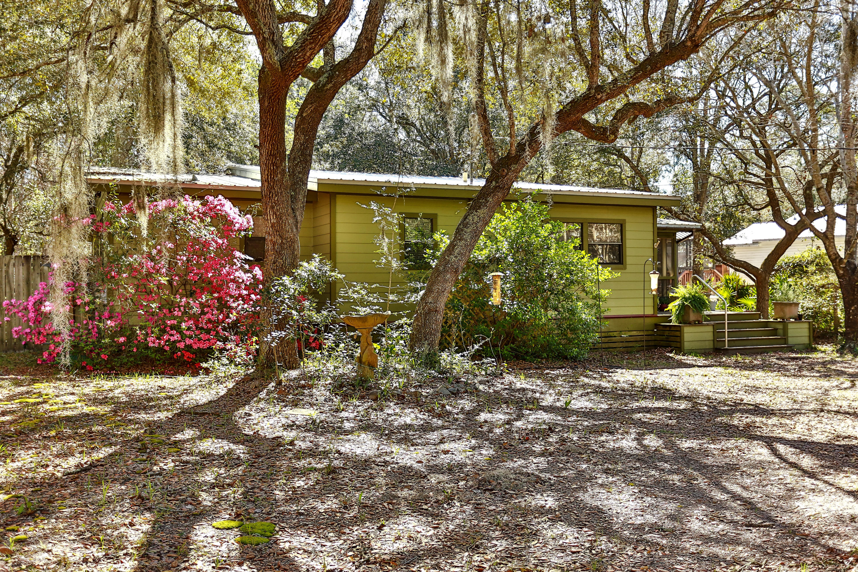 Charming home for the nature lover near the Choctawhatchee Bay boasts a .45-acre lot with an abundance of oak trees. The home sits in the back portion of the property offering a large front yard with plenty of room for expansion and parking. Yard is 3/4 fenced with closed in area for pets. New HVAC unit and recently added metal roof and exterior paint job marks this cozy Florida cottage ready to go. Interior includes two bedrooms, 1 -1/2 baths with Florida room that can be easily converted into a 3rd bedroom. Close proximity to Pilcher Park with boat ramps and fishing pier, Alaqua Bark Park, and Padgett Park with splash pad for the little ones. A small creek behind the home feeds out to the Bay.