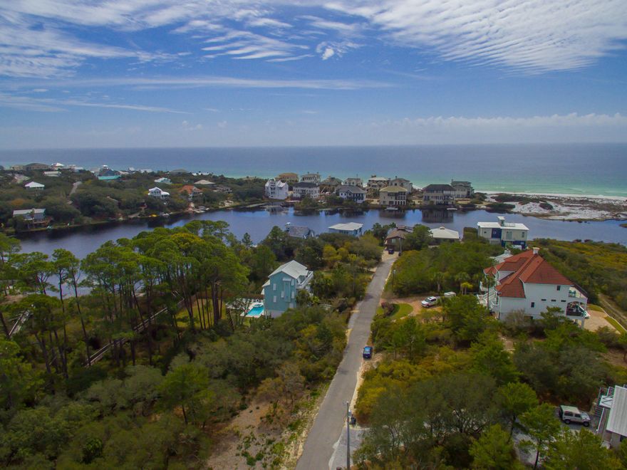 Located on West End of 30-A close proximity to Butler Elementary and The Gulf Place Entertainment and Shopping Center. Multiple beach access' within a short walk or stroll.Looking for lot to build your home? This lot has potential Gulf and Coastal Dune Lake views. Lot is 75x150 with No HOA or build out times. Street is quiet and private. Listing has feasibility study and survey attached. Small amount of wetlands on east side of property that should not interfere with build out plans. Lot 10 is also available for sale which would increase total acreage to over a 1/2 acre. Please refer to Feasibility Study attached to this listing. Most questions regarding this lot can be answered there.