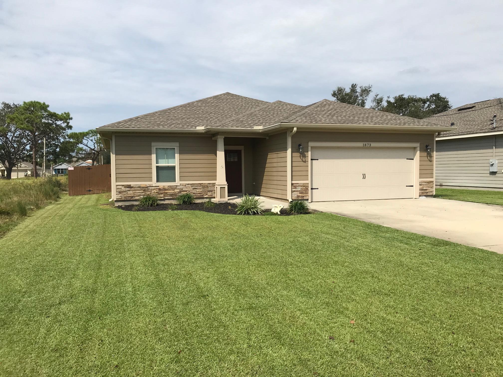 Minutes to Hurlburt, Four years young and numerous upgrades make this home picture perfect and move-in ready! From the durable cement fiberboard siding, to the architectural shingled roof, lawn pump, sprinkler system, stained privacy wood fence and lush zoysia grass!Open floor plan with Tray/coffered ceilings, crown molding and beautiful laminate vinyl, looks like wood, flooring, so easy to care for! And comfortable to walk on. Spectacular trey ceilings in master bedroom, dining and entry area. Transom windows over the hall entryways provide a high and custom touch. Open kitchen with island , granite counters, recessed lighting, stunning dark wood cabinets, Stainless appliances including the upgraded refrigerator all convey and so do the Washer and dryer! Range is vented outside. MORE..
