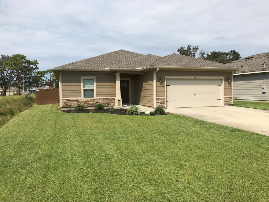 Minutes to Hurlburt, Four years young and numerous  upgrades make this home picture perfect and move-in ready! From the durable cement fiberboard siding, to the architectural shingled roof, lawn pump, sprinkler system, stained privacy wood fence and lush zoysia grass!Open floor plan with Tray/coffered ceilings, crown molding and beautiful laminate vinyl, looks like wood, flooring, so easy to care for! And comfortable to walk on. Spectacular trey ceilings in master bedroom, dining and entry area. Transom windows over the hall entryways provide a high and custom touch. Open kitchen with island , granite counters, recessed lighting, stunning dark wood cabinets, Stainless appliances including the upgraded refrigerator all convey and so do the Washer and dryer! Range is vented outside. MORE..