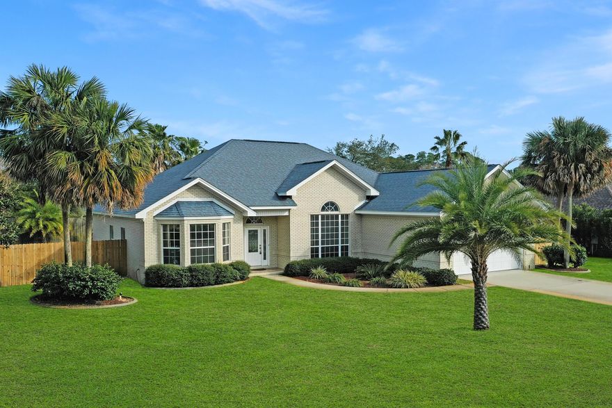 Custom brick and quality built home located in the Elite Waterfront Community of Costa Verde. Only 21 homesites with deeded waterfront access to the sound. Meticulously maintained home is move in ready! Open floor plan with high ceilings and many windows allows the natural light to flow through. 3 bedrooms, 2.5 baths, plus a flex space perfect for your home  office/playroom/game room/4th bedroom. Elevated ceilings with crown molding, electric fireplace and a spacious living room opens out onto a nice size covered tile porch. Very private, fenced backyard is landscaped with plenty of room for entertaining. Kitchen features granite counters, stainless LG appliances, plenty of cabinets, breakfast bar and nook, and a pantry. Master Suite with 2 walk-in-closets, separate vanities, more separate shower, and garden tub. Flex space off the Foyer on the front of house. 2 additional bedrooms are situated on the other side of the house and share a bath. 1/2 bath conveniently located off the laundry room and has easy access from a glass door to the side yard where an outside shower is located.  Plenty of storage places in this home, plus a 2 car garage. Landscaping is easy to maintain w/sprinkler system, well and pump.