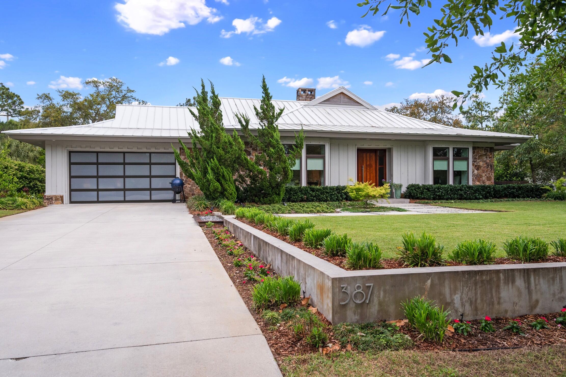 One of the best locations in the quiet non-rental neighborhood. Home was completely remodeled in 2016. All new plumbing, wiring, and networking installed. House sells furnished with a few artwork exclusions. Includes four-seat StarEV golf cart purchased in 2018.Features all luxuriously finished with high end lighting and fixtures. Bathrooms feature custom tile, cabinetry, walk-in showers and two stone resin tubs. Living space features a stunning double sided tiled wood burning fireplace and twelve foot sliding glass doors looking out on the Link's Golf Course. Kitchen features Kitchenaid appliances including a double oven, large stainless refrigerator, microwave, and glass top stove all surrounded by european styled custom cabinetry.