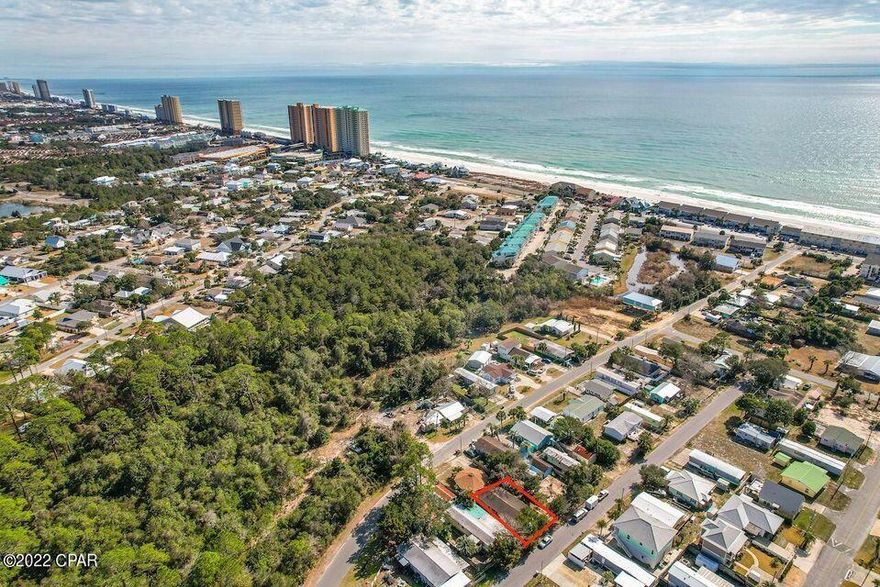 Looking for a Lot South of 98 and on the West end? You can't beat the location of this one! About a block and a half to Laguna Beach! Build your own home or vacation rental and enjoy all that Laguna Beach has to offer. Sewer is available on street The location is brilliant! Laguna Beach is a golf cart friendly community with its own Beachy lifestyle. It has its own grocery store, (Carousel), ice cream and Donut shop (Thomas's Donuts) and best of all a reserved beach just a few blocks away! This location is only a few minutes away from the 30A corridor going east and only a few minutes to Pier Park going west. This truly is a sweet investment piece. Come check it out!There is a condemned mobile home that buyer will need to remove and a septic tank that buyer will need to abandon. Drive by