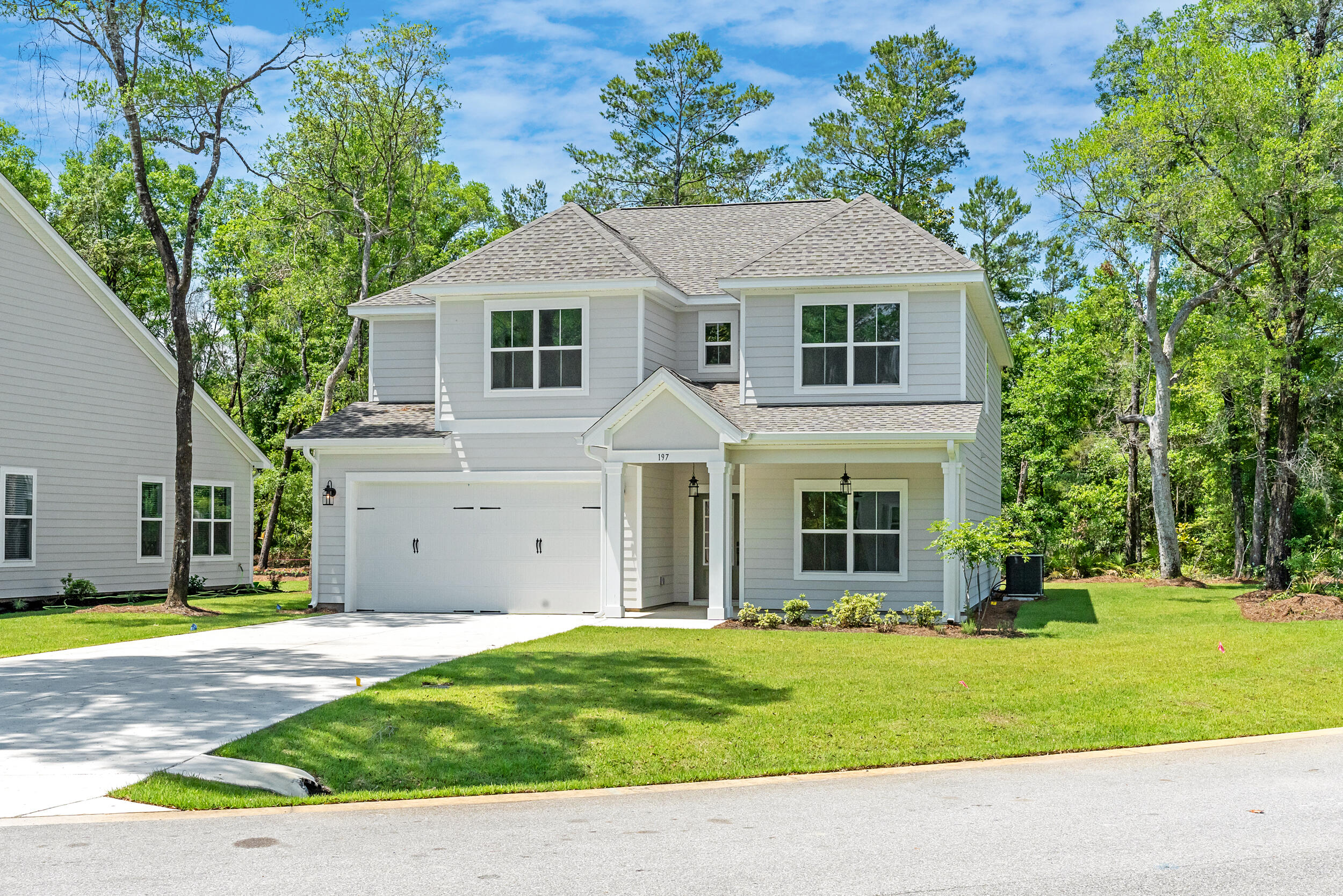Ready Now! Up to $5K in Closing costs. Contract must be written by 06/30/25 and must use Traton Preferred Lender. New construction in Freeport. Magnolia Bay Estates is a gated community, located conveniently off FL-20. This highly desirable 2 story home reflects living at its finest. The Fulmont home plan which will sit on Lot 29, boasts 5 bedrooms (1 on the main level) and 4 full baths with a 2-car garage. The kitchen is bright and airy with quartz counter tops, island and large walk-in pantry. Large open concept living in the main areas. Loft is perfect for an office. The large back porch is screened and is perfect for entertaining. The main bedroom has a spacious walk-in closet, separate shower/tub and double vanities. Blinds throughout the home.