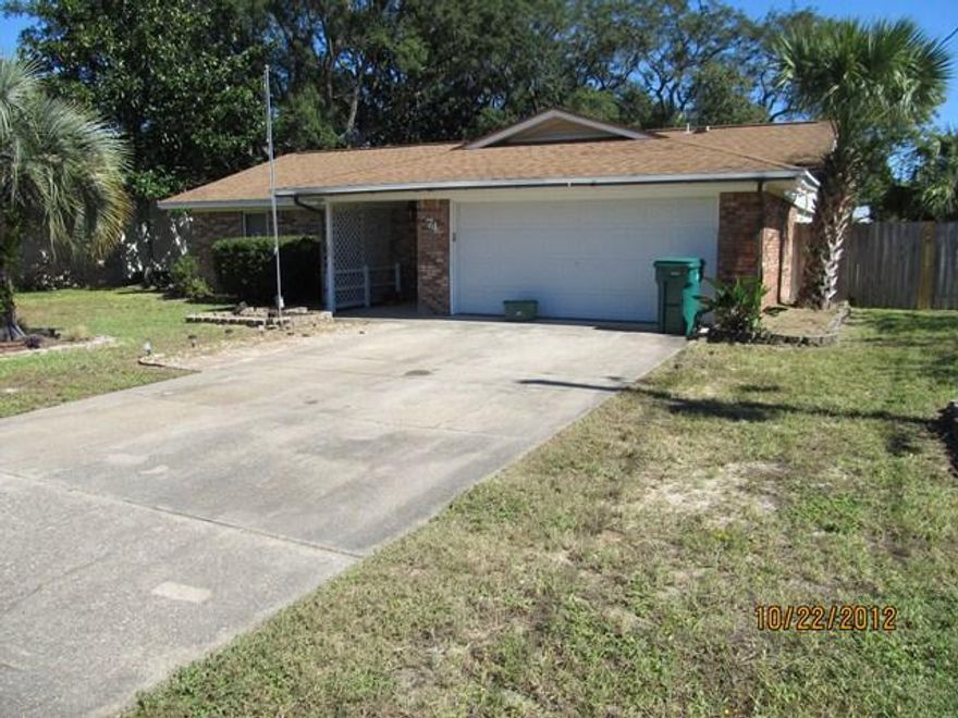 A beautiful corner lot home located in the heart of Shalimar in the Port Dixie area. Close to Eglin, schools, dining and more! Ceramic tile adorns the foyer, kitchen/dining area and both bathrooms. The kitchen includes flat cooktop with a range hood a large refrigerator and dishwasher with a double pantry. The large screened in patio has indoor/outdoor carpeting. The master bedroom is nicely carpeted with a walk-in closet. The yard has a lawn pump with sprinkler system. Home also has a security system. No smoking. Owner will consider pets with $250 non-refundable pet fee.