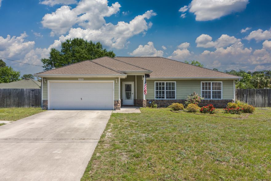 Yay, no carpet in entire home! All wood vinyl flooring was installed in 2019 and is stunning throughout this home.  The kitchen is a dream and boasts cabinets galore! Stainless steel appliances include smooth glass top stove, built in microwave, dishwasher, and French door fridge. Granite counters with plenty of space for all your needs with a breakfast bar, kitchen island, and more!  Ceiling fans throughout and tile in all wet areas.  Bonus features abound including Nest Thermostat, Smart lightbulbs in living/entry to work with Alexa, speaker wired, hurricane shutters, and washer dryer convey. Backyard features a privacy fenced yard, nice and level. Two car garage and convenient subdivision located close to Publix plaza and new complex development for shopping.
