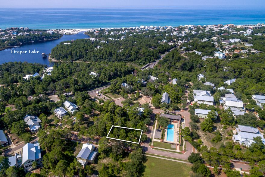Fantastic opportunity to build your dream home in the gated community of Forest Lakes! This vacant land parcel is conveniently located on a corner, directly across from the community pool and just across the street from the manicured green space and community pond. Forest Lakes is a gated community close to everything on the west end of 30A, while offering a peaceful feel in a tree-filled neighborhood. Be sure to check out this great lot!