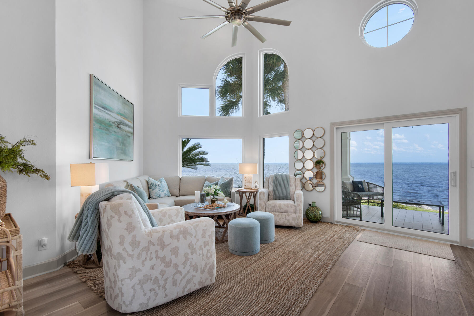 BAY FRONT ELEGANCE and TURN KEY!. Sandestin 3 Bedroom 3 bath Designer Home.Discover the perfect blend of comfort, style, and waterfront living in this stunning property located in the small exclusive community of Northshore.Thoughtfully decorated by a professional designer. This residence is updated and offers a warm inviting atmosphere ideal for families and entertaining alike.Soaring high ceilings, spacious open-concept living and large windows that fill the home with natural light and frame picturesque views of the bay.Each bedroom is generously sized providing ample space and privacy for family and guests. The primary suite offers a serene retreat with spectacular views. Enjoy your morning coffee on the patio and end each day with drink. 6 Seat Golf Cart is Negotiable!
