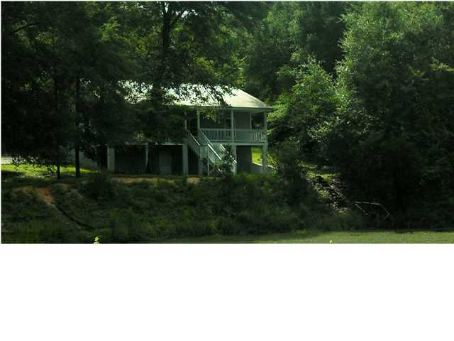 Home on over 5 acres in town, providing you the feel of country living without the drive. Home features a sun porch and gas stove! Large master bath with sep shower, tub and walk-in closet. Porches for relaxing. Downstairs has a walk-out basement approx. 828 sq ft that is partially finished, great for storage or ready for your imagination and is where the laundry is located. Measurements approximate. School information subject to change. Tenant should verify for themselves any information deemed important.