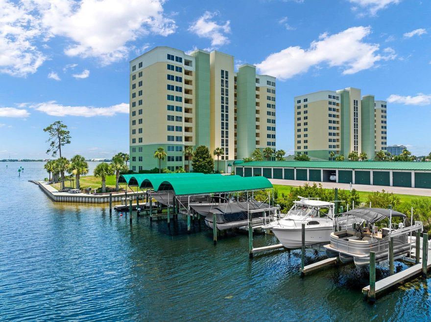 **A Boater's Paradise** This unit is being sold with a boat slip, new deck & 10,000 lb boat lift! Hibiscus By The Bay is an exclusive waterfront community with private marina & is one of Panama City Beach's best kept secrets. This exquisite 2BR/2BA residence features a large balcony overlooking St. Andrew's Bay, stunning Bay views from the living room and master and is being sold FULLY FURNISHED tastefully decorated, new paint and brand new LVP flooring throughout. Quiet location featuring 625 ft of direct waterfront & 500 ft fishing pier, convenient to town, only a few minutes to the world's most beautiful beach, unmatched amenities including gated access, onsite gym, library, tennis court, courtyard, a Bay front pool & hot tub, BBQ grills, large community room for hosting parties