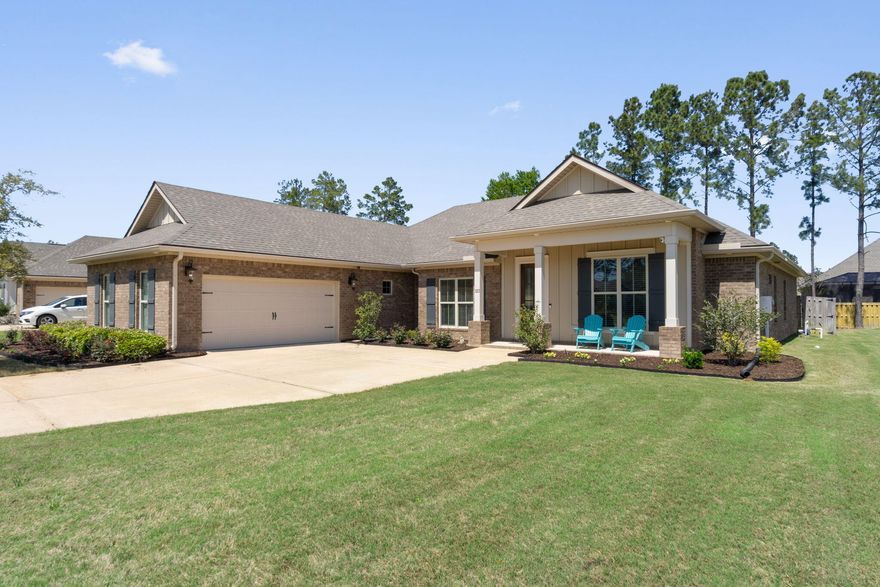 NEW PRICE! Nestled in the coveted Buxton Mill area of Hammock Bay, this home emerges as a haven for families looking to flourish. 'The Madison,' crafted by Truland Homes, unfolds over 2540 square feet of warmth and welcoming spaces, featuring four bedrooms and three bathrooms to comfortably accommodate everyone. Its side entry garage and courtyard parking, set against a backdrop of meticulously tended landscapes and a striking real wood stained front door, promise a heartwarming welcome.As you step inside, the home opens into a realm of sophistication with stainless appliances, pristine white cabinetry, and a gas range set against an open, split floor plan designed for both gatherings and serene moments. The living room, anchored by a gas fireplace, offers a cozy retreat for chilly..