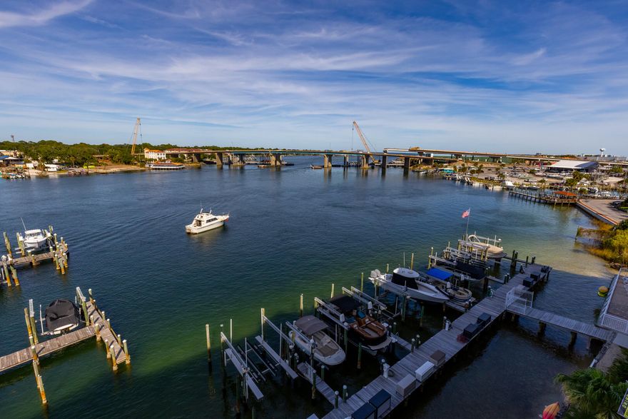 Awesome views from this 2 bedroom/2 bath penthouse unit on the 6th floor.  This top floor unit comes with 10' ceilings(no other floor has ceilings that high), 2 reserved covered garage spots (next to each other) and a storage unit, the biggest boat slip in the complex at 43'.  The boat slip comes with 50 amps of power and water and 2 marine dock boxes.  Gated community.  Short term rentals allowed.  Bring your own furniture as it's being sold unfurnished however kitchen appliances stay.